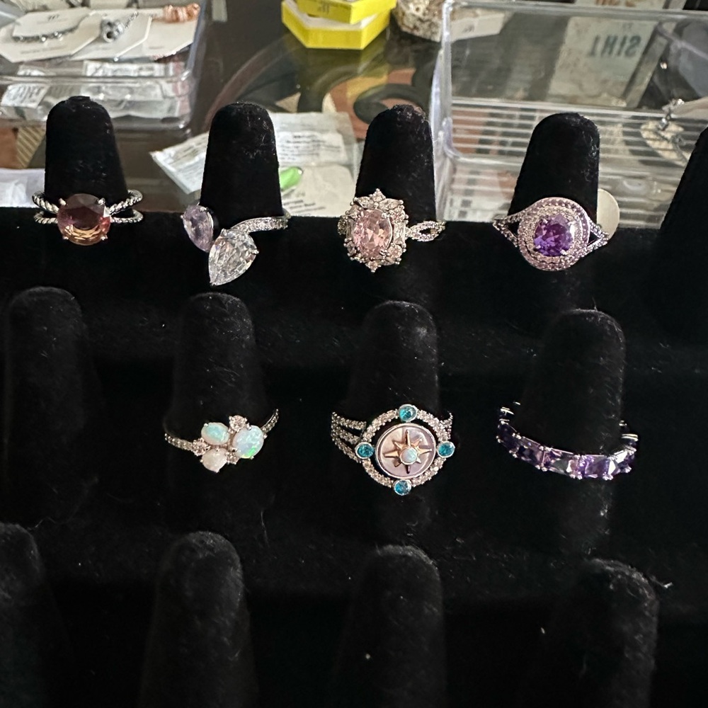 Purple and Silver Gemstone Ring with Intricate Design
